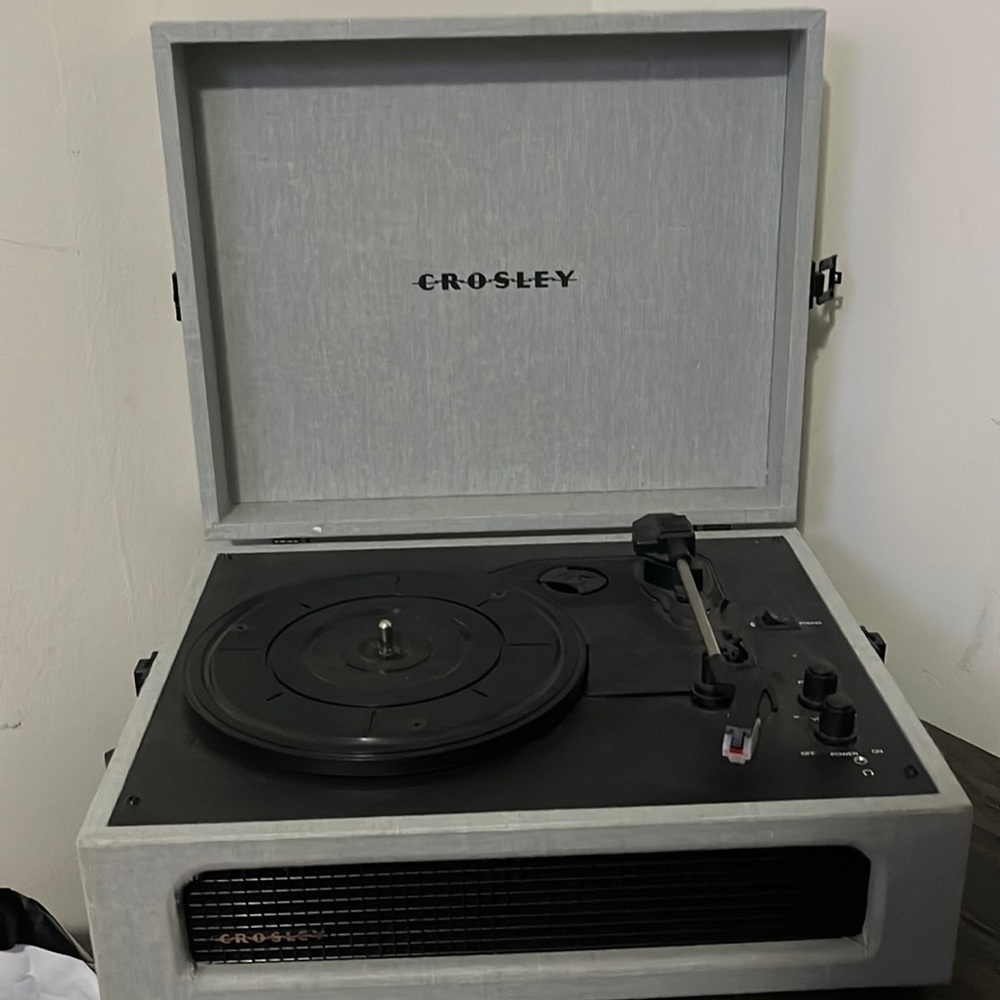 Crosley record player, grey with some little spots which can be cleaned.